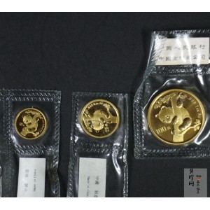 【969160】1996年中国熊猫币发行15周年1盎司、1/4盎司、1/10盎司普制金币各一枚，共三
