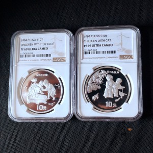 【949180】1994年中国古代名画婴戏图-冬日戏猫图、子孙和合图纪念银币两枚一套